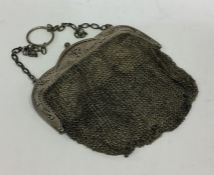 A heavy Continental silver mesh purse. Approx. 166