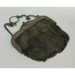 A heavy Continental silver mesh purse. Approx. 166