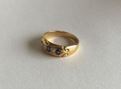 A lady's 18 carat sapphire and diamond five stone