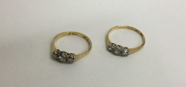 Two 18 carat diamond mounted rings. Approx. 4 gram