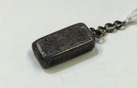 A Victorian hinged top miniature silver vesta case