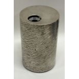 An unusual silver mounted lighter with textured bo