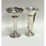 A silver tapering spill vase together with one oth