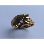 A heavy gent's gypsy set ring in the form of a hor