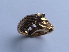 A heavy gent's gypsy set ring in the form of a hor