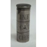 An unusual triple cylindrical silver scent bottle.