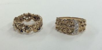 A gent's 9 carat gold keeper ring with diamond buc