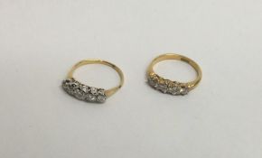 Two 18 carat diamond five stone half hoop rings wi