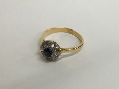 An 18 carat sapphire and diamond Art Deco cluster