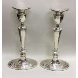 A pair of tall boat shaped Adams' style silver can