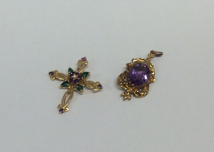 An amethyst and gold pendant together with one oth