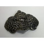 A Russian silver and Niello buckle. Punched to rea