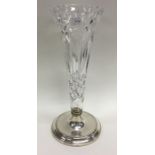A tapering cut glass and silver mounted spill vase
