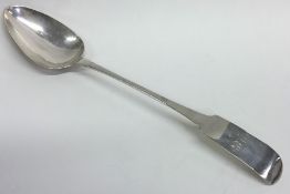 A massive fiddle pattern silver basting spoon. Dub