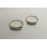 Two 18 carat diamond five stone half hoop rings wi