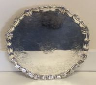 A massive George II silver salver attractively dec