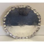 A massive George II silver salver attractively dec