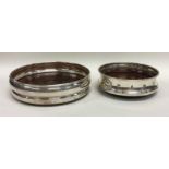 Two modern silver mounted wine coasters with mahog