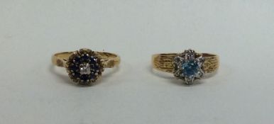 Two 18 carat gold diamond set rings. Approx. 8.4 g