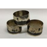 A group of three Indian silver napkin rings decora