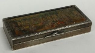 An unusual enamel decorated heavy rectangular silv