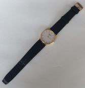 A gent's 18 carat gold Longines slim wristwatch on