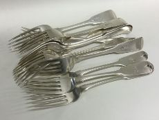 A set of eleven silver fiddle pattern dessert fork