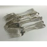 A set of eleven silver fiddle pattern dessert fork