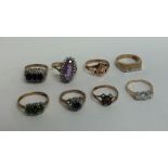 A bag containing eight 9 carat gems set rings. App
