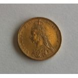 An 1889 full sovereign. Est. £200 - £300.