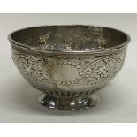 A good quality Victorian silver sugar bowl with le
