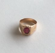 A good 9 carat gold and res stone ring engraved wi