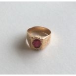 A good 9 carat gold and res stone ring engraved wi