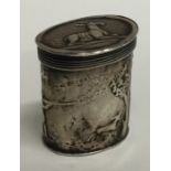 A small oval Dutch silver snuff box depicting a hu