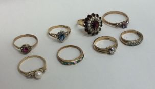 Eight 9 carat gem set rings. Approx. 19.1 grams. E