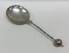 An unusual silver presentation spoon with twisted