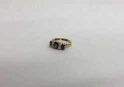 A Victorian sapphire and diamond seven stone ring