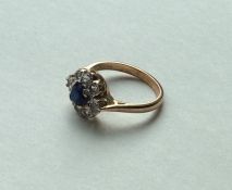 A sapphire mounted dress ring in 9 carat claw moun