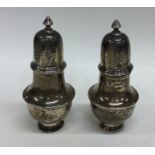 A pair of silver peppers of baluster form. Birming