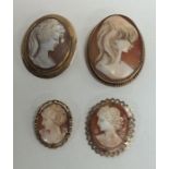 A group of four oval 9 carat gold framed cameos. A
