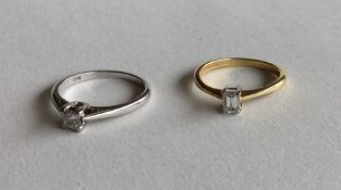 Two 18 carat gold baguette cut single stone rings.