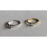 Two 18 carat gold baguette cut single stone rings.