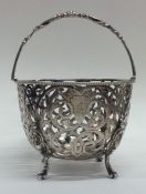 A Victorian silver pierced sugar bowl with scroll