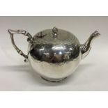 A Victorian silver bullet shaped teapot with flush