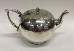 A Victorian silver bullet shaped teapot with flush