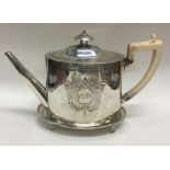 A good Georgian silver teapot on stand with attrac