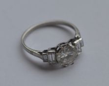 An Art Deco French diamond single stone ring in cl