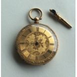 An 18 carat Swiss fob watch together with a key. A