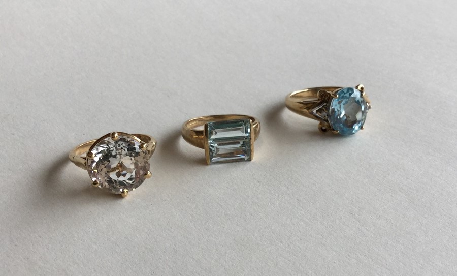 A group of three heavy 9 carat single stone rings.