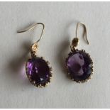 A pair of Antique gold stone set earrings with loo